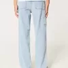 Jeans larghi da pittore con lavaggio chiaro