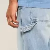 Jeans larghi da pittore con lavaggio chiaro