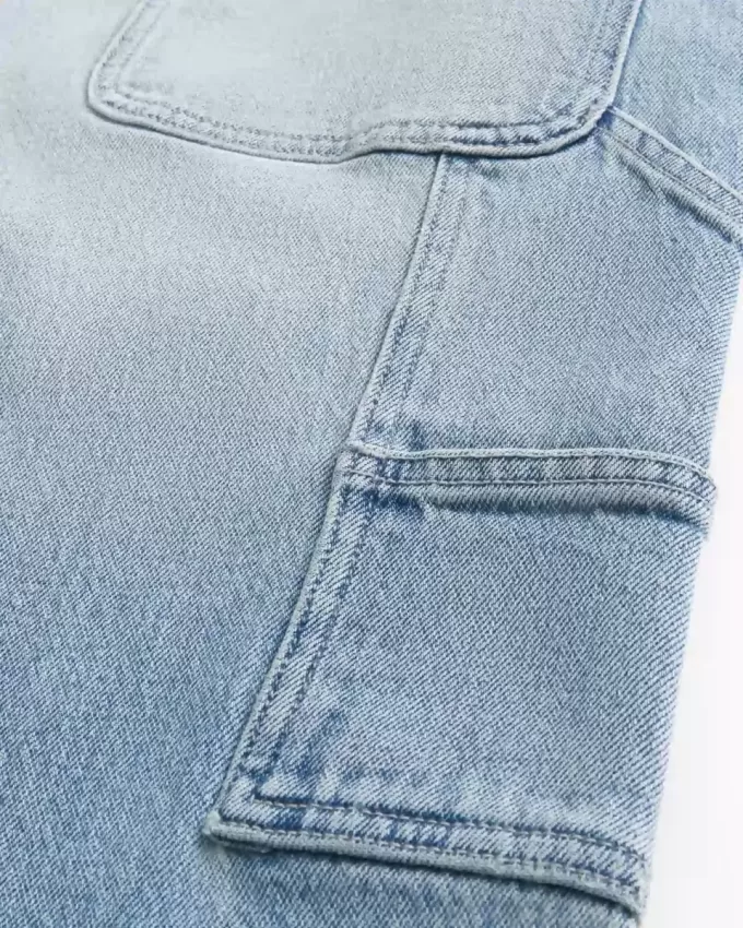 Jeans larghi da pittore con lavaggio chiaro