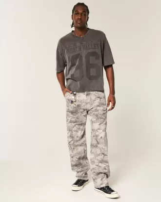 Jeans larghi da pittore stile skater mimetico