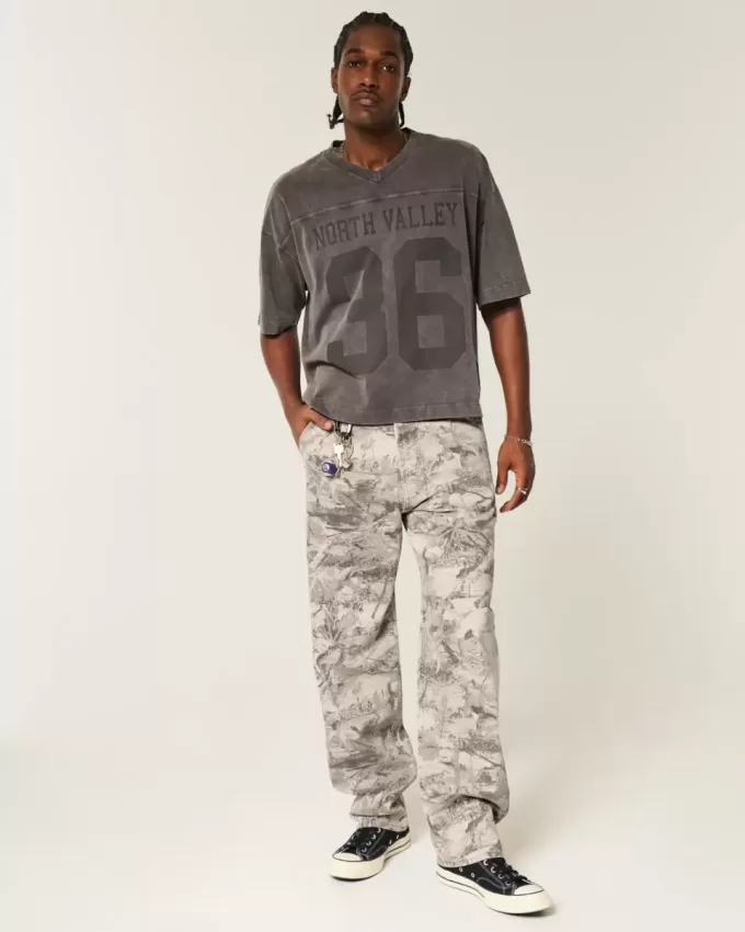 Jeans larghi da pittore stile skater mimetico