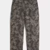 Jeans larghi da pittore stile skater mimetico