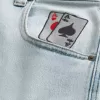 Jeans larghi da skater con grafica di carte da gioco e lavaggio chiaro
