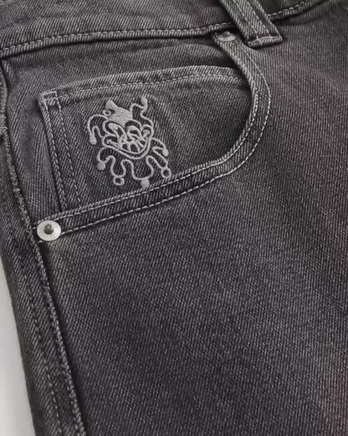 Jeans larghi da skater con grafica Joker e carte da gioco nere lavate