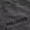 Jeans larghi da skater con logo grafico nero lavato