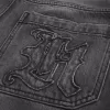 Jeans larghi da skater con logo grafico nero lavato
