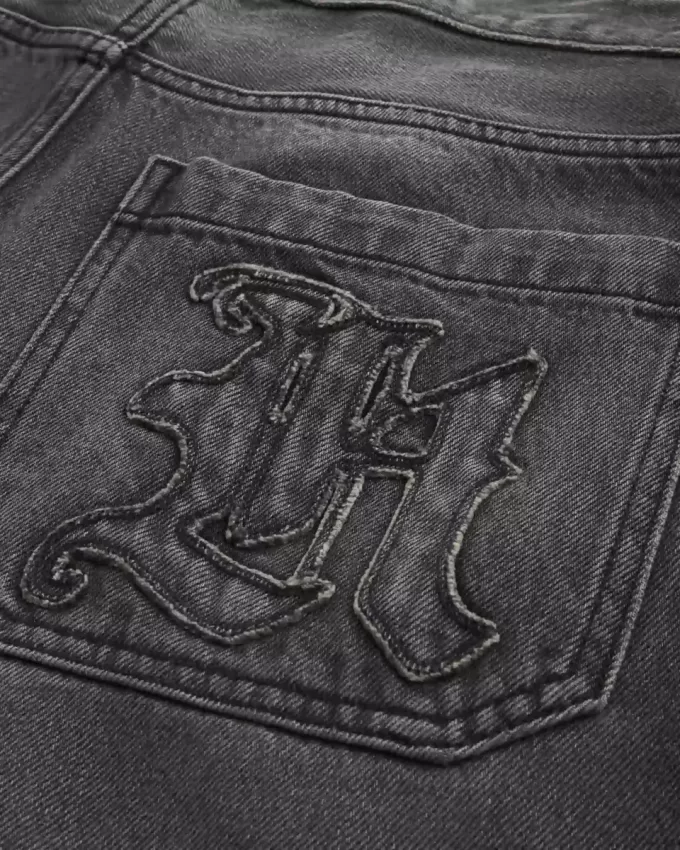 Jeans larghi da skater con logo grafico nero lavato