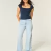 Jeans larghi e a vita alta con lavaggio chiaro