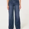 Jeans larghi e a vita alta con lavaggio scuro