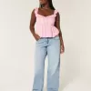 Jeans larghi e a vita bassa con lavaggio chiaro Jeans larghi e a vita bassa con lavaggio chiaro