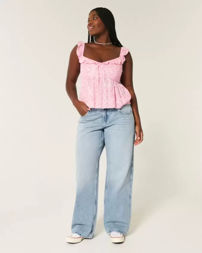 Jeans larghi e a vita bassa con lavaggio chiaro Jeans larghi e a vita bassa con lavaggio chiaro