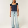 Jeans larghi e a vita bassa con lavaggio chiaro