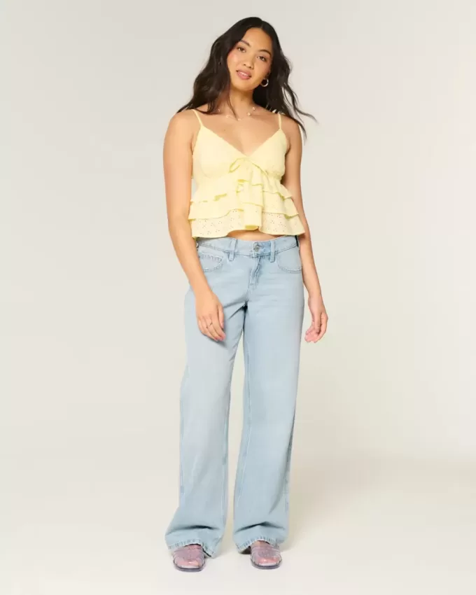 Jeans larghi e a vita bassa con lavaggio chiaro Jeans larghi e a vita bassa con lavaggio chiaro