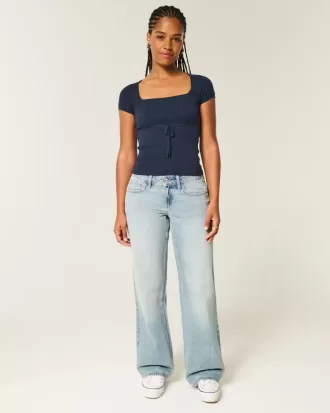 Jeans larghi e a vita bassa con lavaggio chiaro