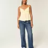 Jeans larghi e a vita bassa con lavaggio scuro