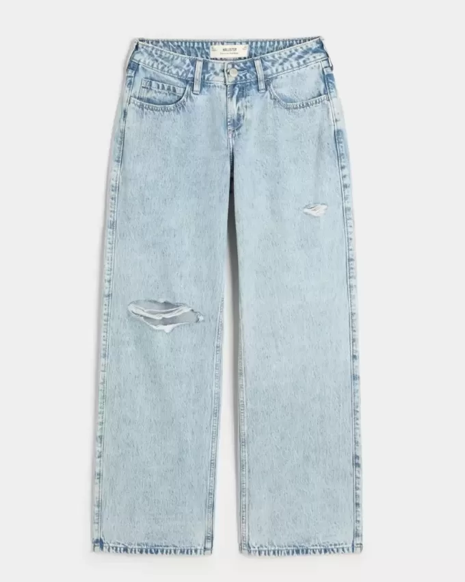 Jeans larghi e strappati a vita bassa con lavaggio chiaro