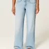 Jeans larghi e strappati a vita bassa e curvy