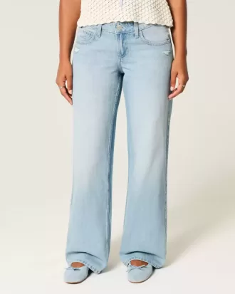 Jeans larghi e strappati a vita bassa e curvy
