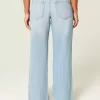 Jeans larghi e strappati a vita bassa e curvy
