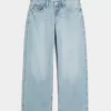 Jeans larghi e strappati a vita bassa e curvy