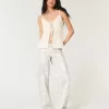 Jeans larghi mimetici a vita bassa