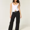Jeans larghi neri a vita bassa e curvy Jeans larghi neri a vita bassa e curvy