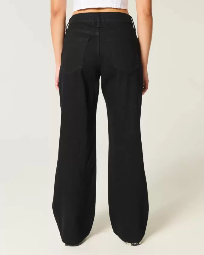 Jeans larghi neri a vita bassa e curvy Jeans larghi neri a vita bassa e curvy