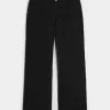 Jeans larghi neri a vita bassa e curvy Jeans larghi neri a vita bassa e curvy