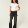 Jeans larghi neri lavati a vita bassa e regolabile