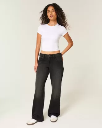 Jeans larghi neri lavati a vita bassa e regolabile