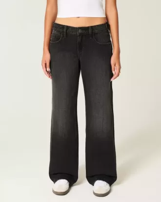 Jeans larghi neri lavati a vita bassa e regolabile