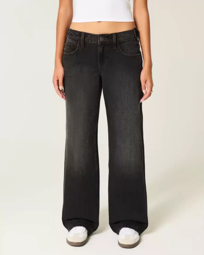 Jeans larghi neri lavati a vita bassa e regolabile