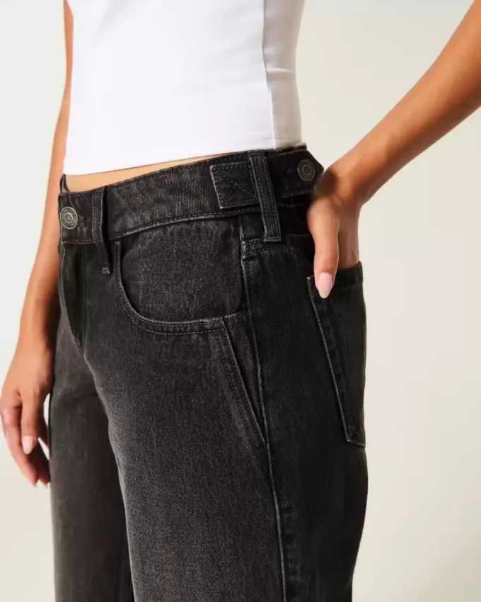 Jeans larghi neri lavati a vita bassa e regolabile