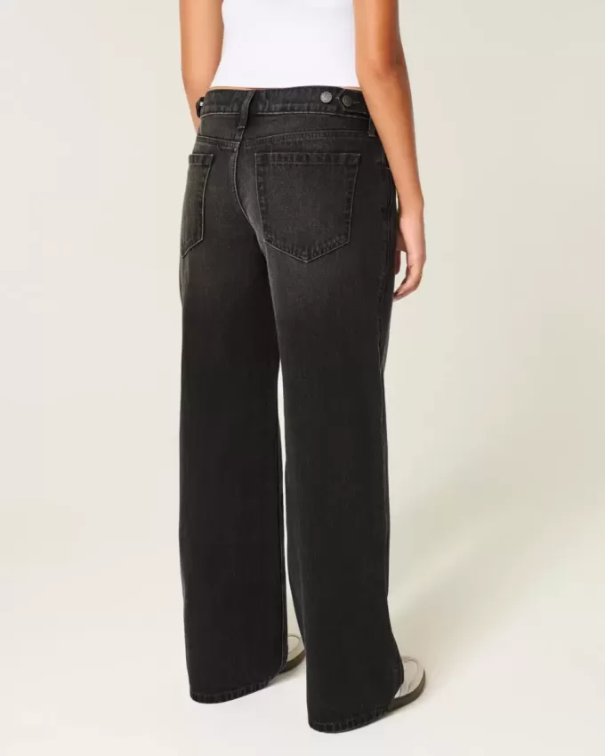 Jeans larghi neri lavati a vita bassa e regolabile