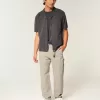 Jeans larghi ricamati da pittore