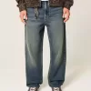 Jeans larghi ricamati lavaggio scuro