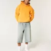 Jeans larghi skater a mezza lunghezza lavaggio chiaro