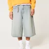 Jeans larghi skater a mezza lunghezza lavaggio chiaro