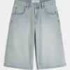Jeans larghi skater a mezza lunghezza lavaggio chiaro