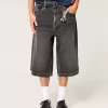 Jeans larghi skater a mezza lunghezza neri lavati
