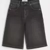 Jeans larghi skater a mezza lunghezza neri lavati