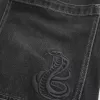 Jeans larghi skater a mezza lunghezza neri lavati