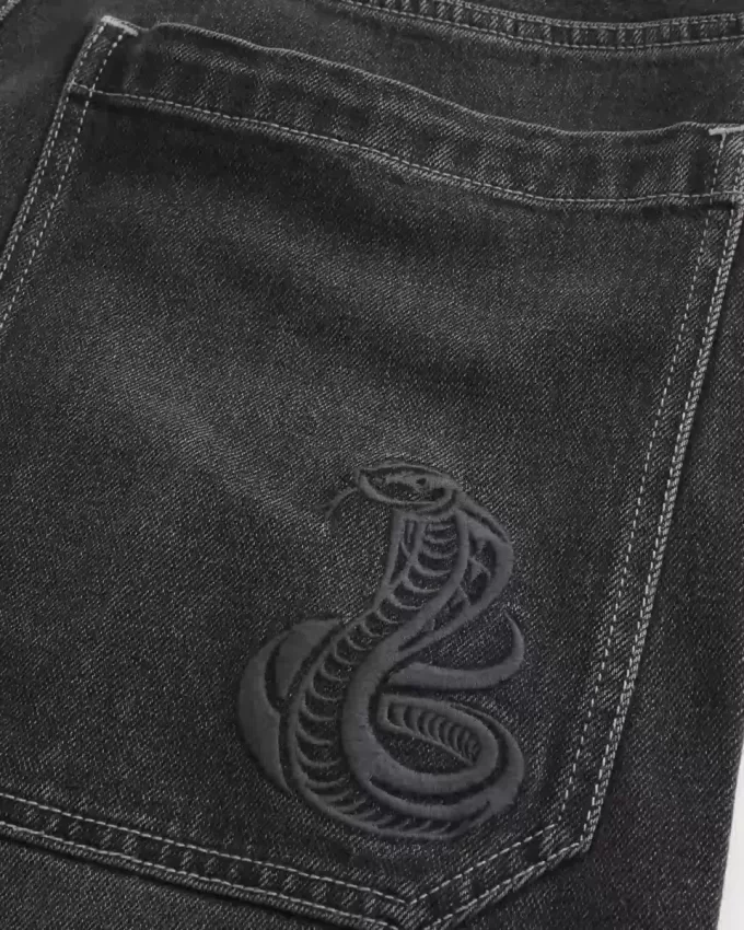 Jeans larghi skater a mezza lunghezza neri lavati