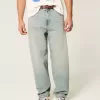 Jeans larghi skater con dadi ricamati e lavaggio chiaro