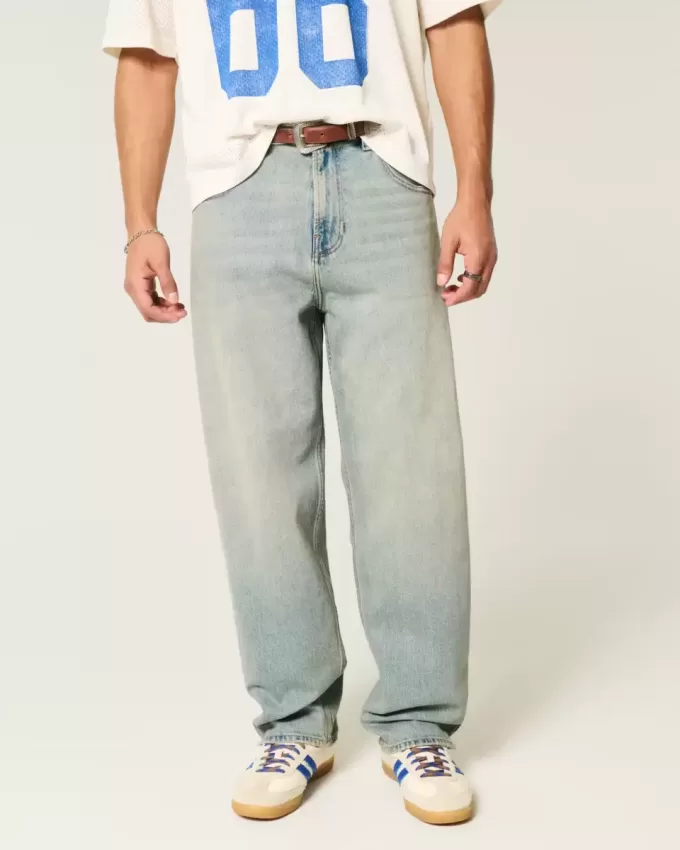 Jeans larghi skater con dadi ricamati e lavaggio chiaro