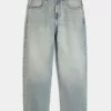 Jeans larghi skater con dadi ricamati e lavaggio chiaro