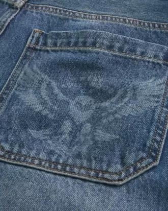 Jeans larghi skater con grafica Eagle e lavaggio medio