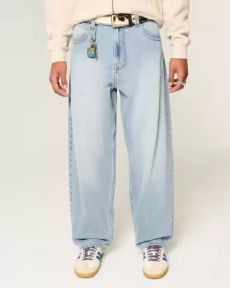 Jeans larghi skater con lavaggio chiaro ricamati