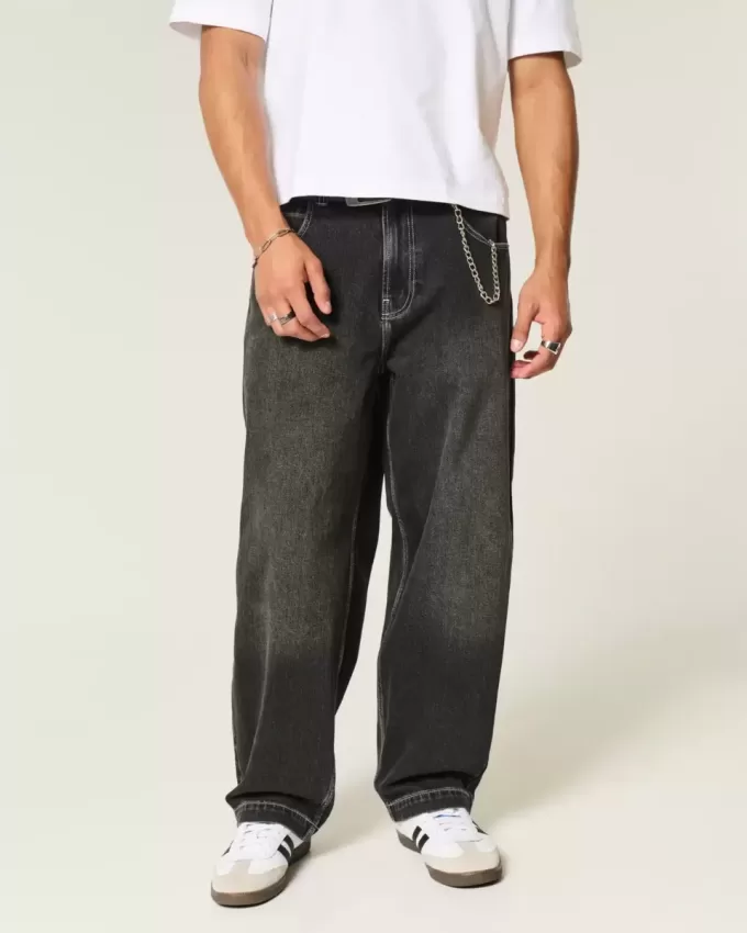 Jeans larghi skater con ricamo serpente nero lavato