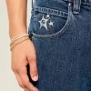 Jeans larghi skater con stampa a stelle e lavaggio medio